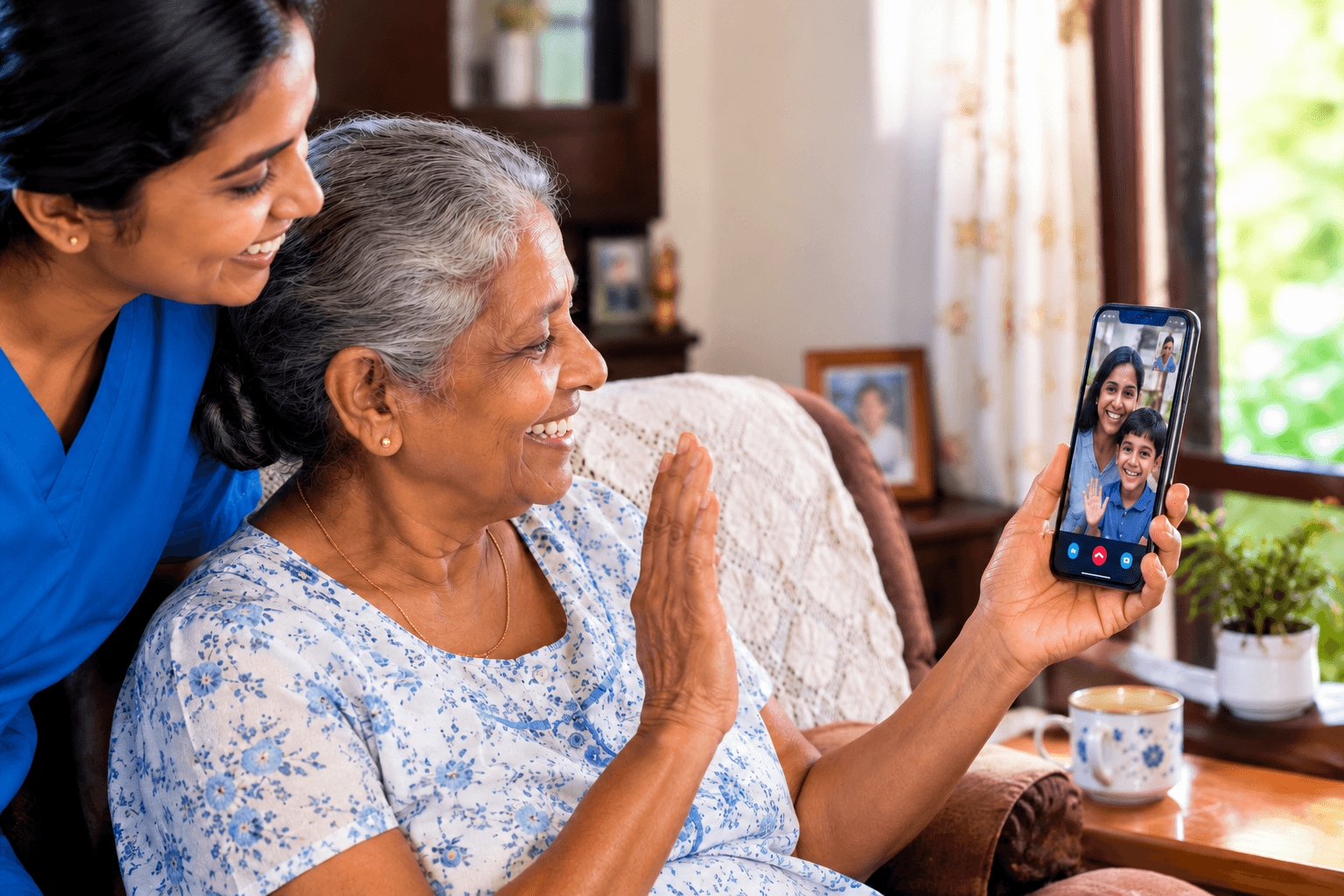 An elderly woman video calling her overseas family with a Careway care coordinator beside her